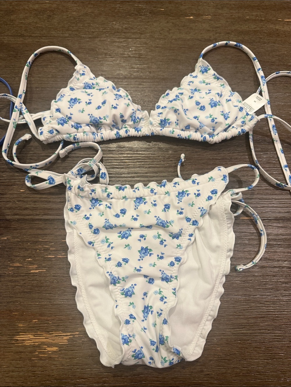 wild fable White Bikini Top with Blue Floral Print Top is xs. Bottoms are small